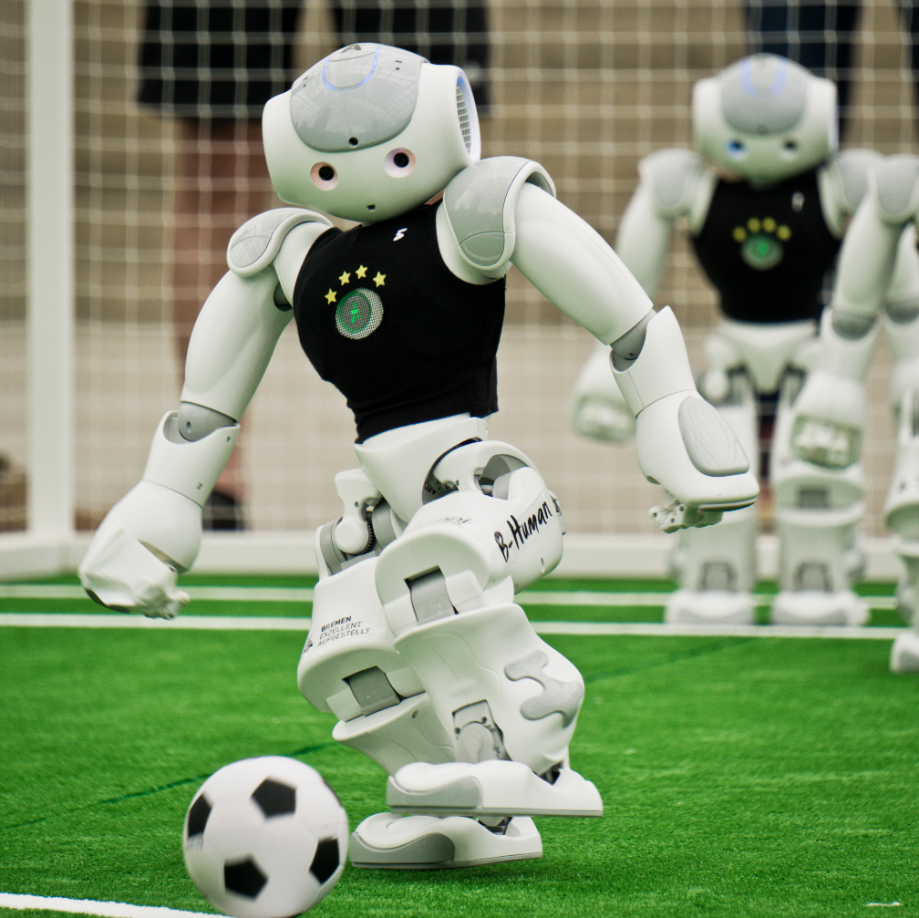 NAO robot playing football